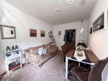 Langjährig vermietet I 7.200 € Jahresmiete I Garage - Essbereich w. Ansicht